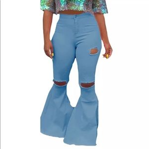 Exaggerated distressed bell bottom pant